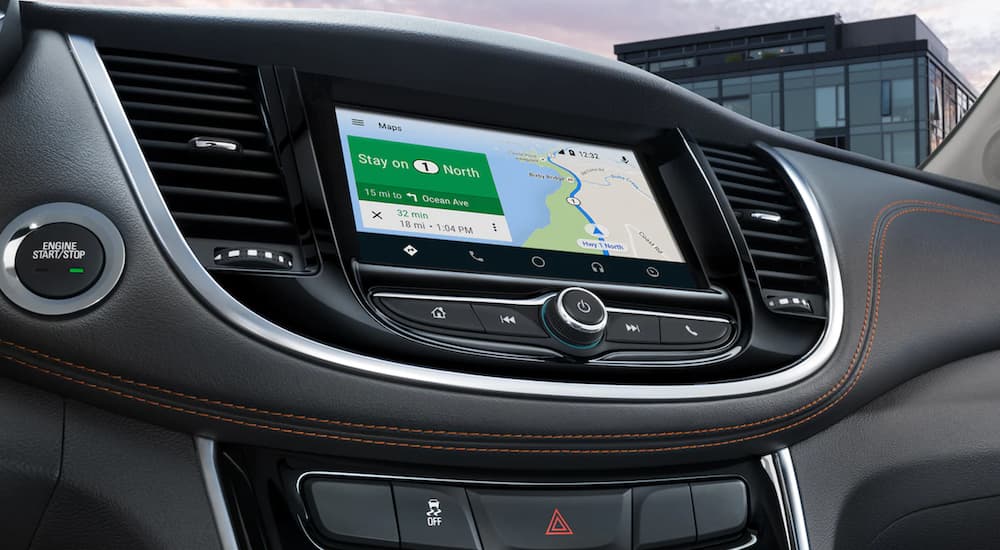 The interior of a 2022 Chevy Trax shows the infotainment screen.