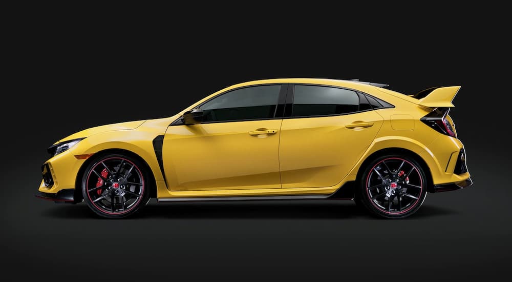 A yellow 2022 Honda Civic Type R Limited is shown from the side at a Honda Civic dealer.