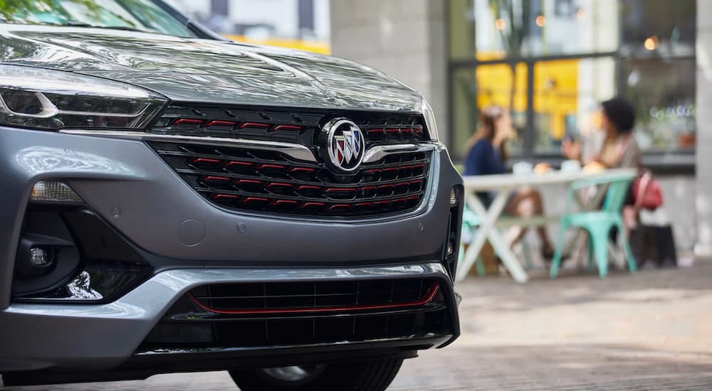 A grey 2022 Buick Encore GX is shows the grille in close up.