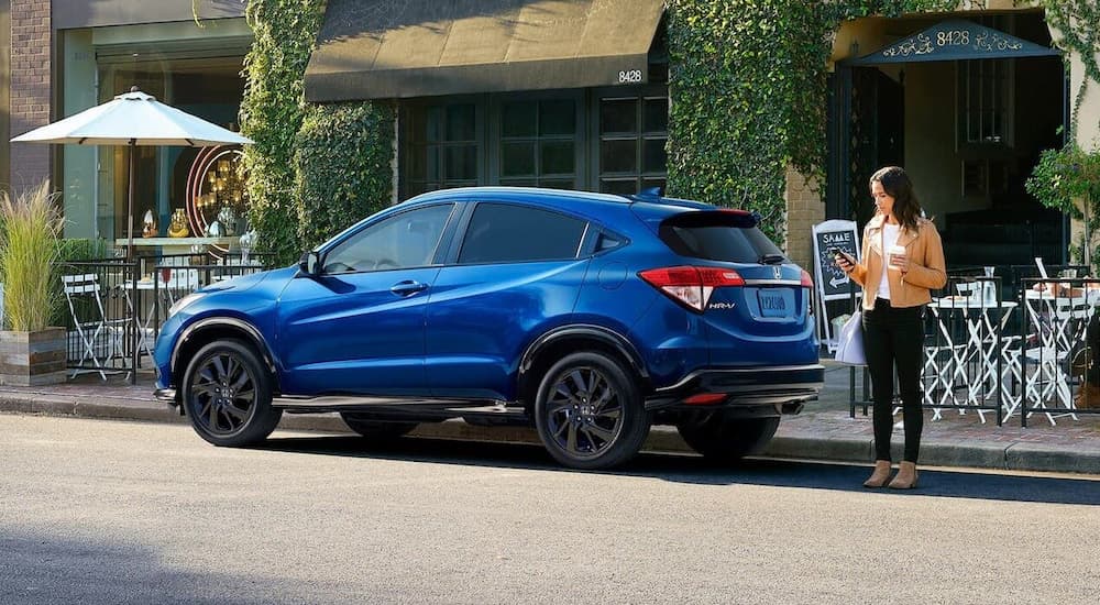 A blue 2022 Honda HR-V is shown parked on the side of a street.