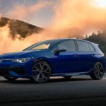 A blue 2022 Volkswagen Golf R is shown parked during a 2022 Volkswagen Golf R vs 2022 Hyundai Veloster N comparison.