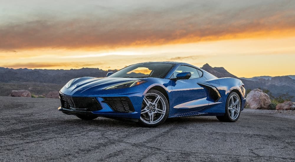 A 2021 Chevy Corvette Stingray is shown parked during a sunset.