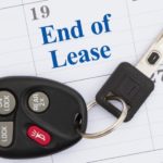 A car key is shown on a calendar marked 'end of lease.'