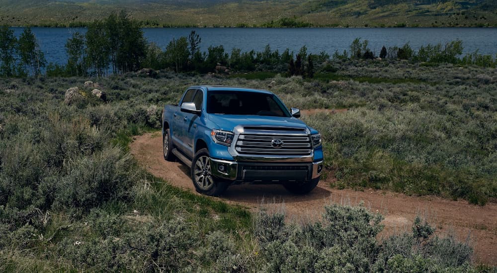 A blue 2021 Toyota Tundra Limited Crewmax is shown during a 2021 Ford F-150 vs 2021 Toyota Tundra comparison.