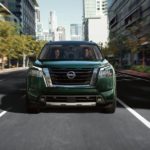 A green 2022 Nissan Pathfinder S is shown from the front during a 2022 Nissan Pathfinder vs 2022 Jeep Grand Cherokee L comparison.