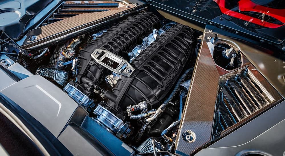 An engine for the 2023 Chevy Z06 is shown being prepared for a Chevy pre-order.