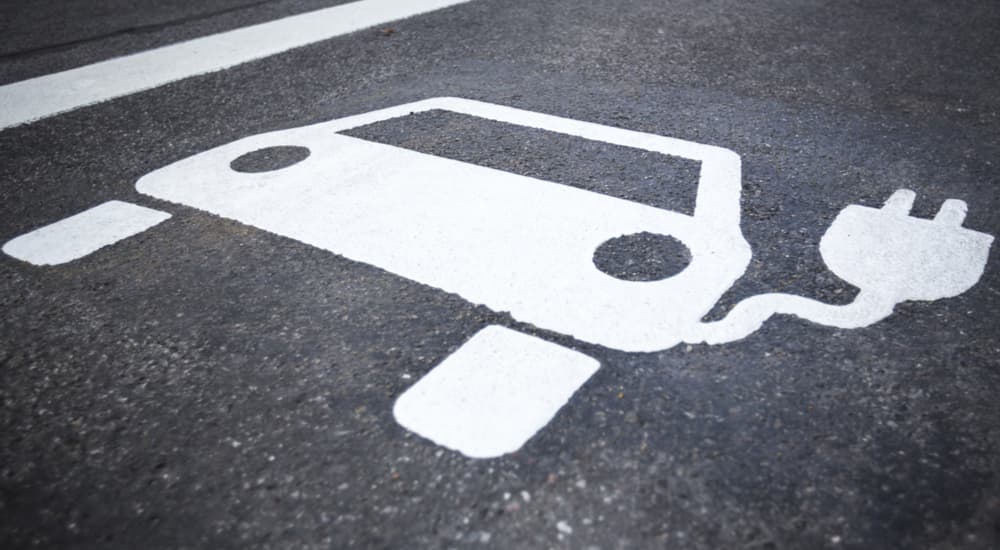 An EV parking symbol is shown at a Honda dealer.