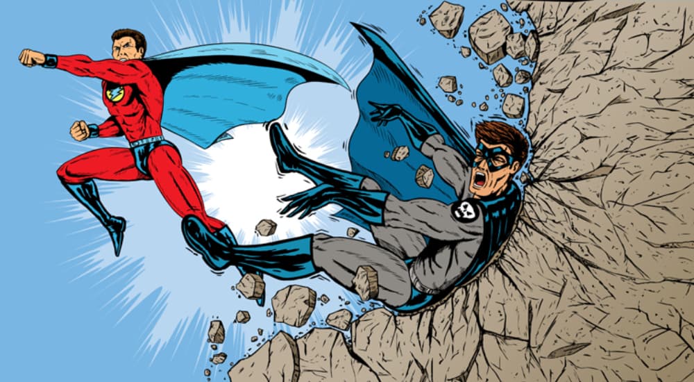 A superhero and villain are shown battling near a cliff.