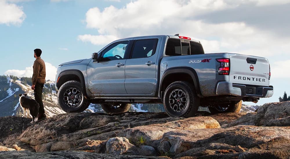 A grey 2022 Nissan Frontier PRO-4X is shown during a 2022 GMC Canyon vs 2022 Nissan Frontier comparison.