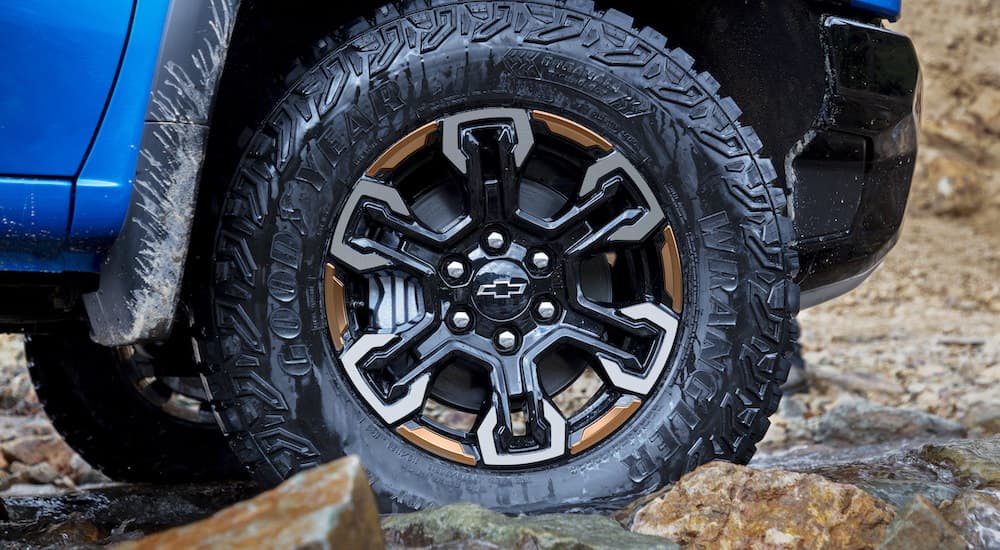 The tire of a 2022 Chevy Silverado 1500 ZR2 is shown in close up.