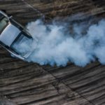 A car from Fast and Furious is shown drifting at a used Nissan dealer.