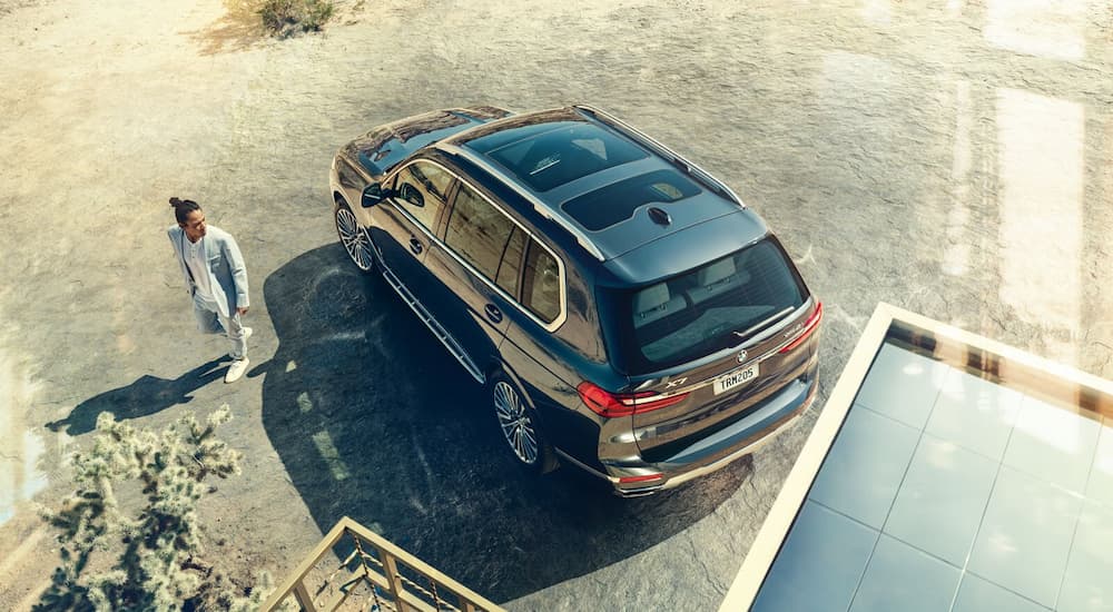 A grey 2021 BMW X7 is shown from a high angle.