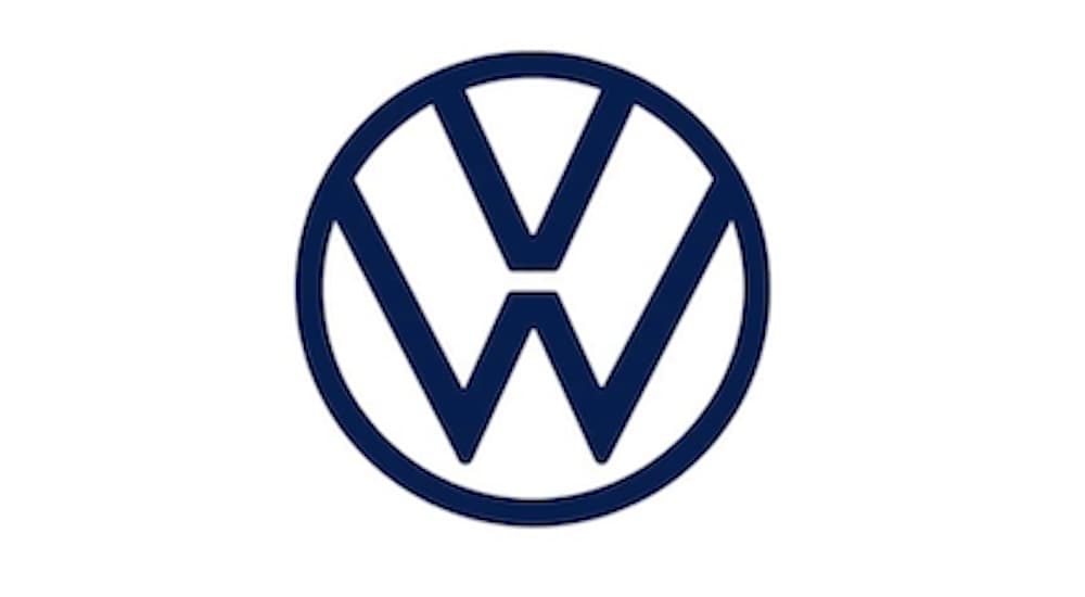 The Volkswagen Logo is shown in close up at a Volkswagen dealer.