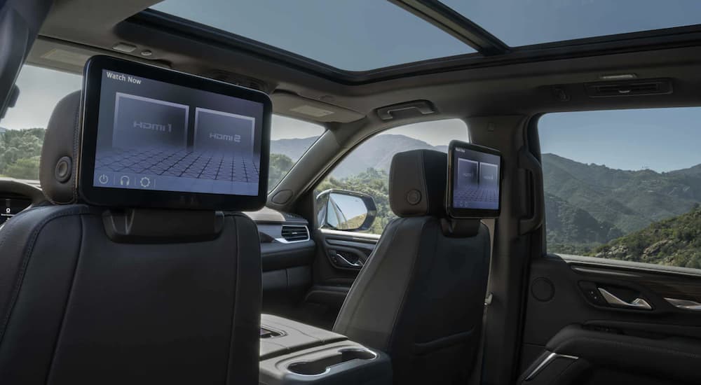Two screens are shown inside of a 2022 GMC Yukon.