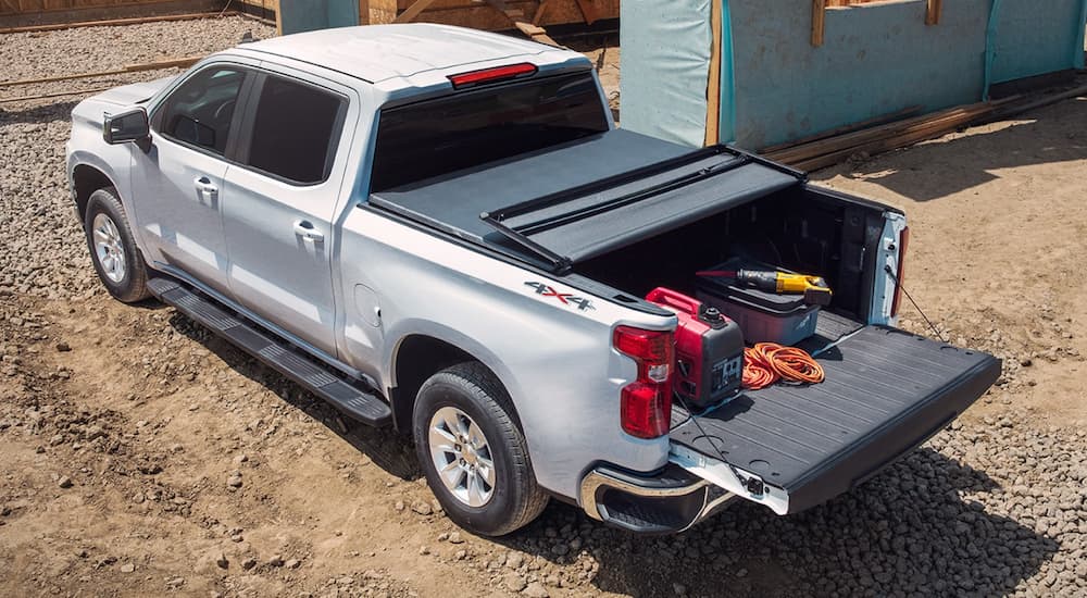 A white 2022 Chevy Silverado 1500 is shown from above during a 2022 Chevy Silverado 1500 vs 2022 Ram 1500 comparison.