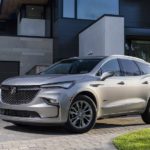 A 2022 Buick Enclave Avenir is shown angled from the front after exiting a Johns Creek Buick dealer.