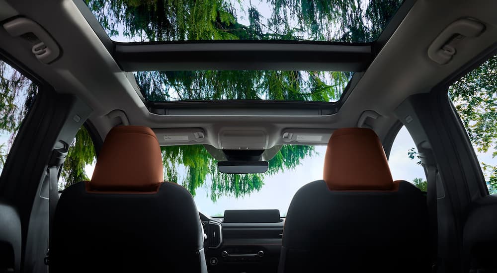 The moonroof in a 2023 Mazda CX-50 is shown from a low angle.