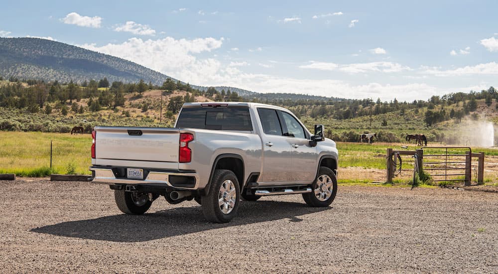 A silver 2022 Chevy Silverado 2500 HD is shown from the rear at an angle after the owner searched '2022 Chevrolet Silverado HD'.