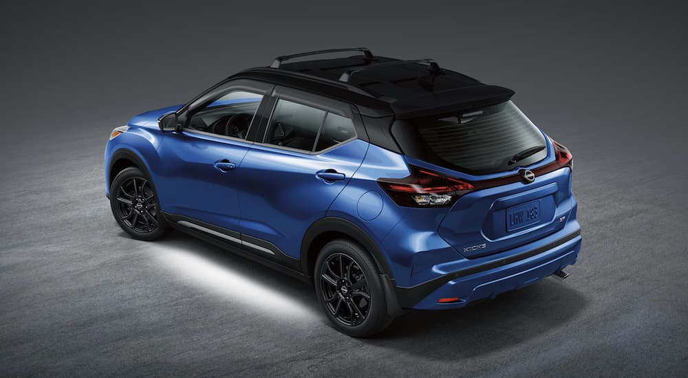 A blue 2022 Nissan Kicks is shown from the rear.