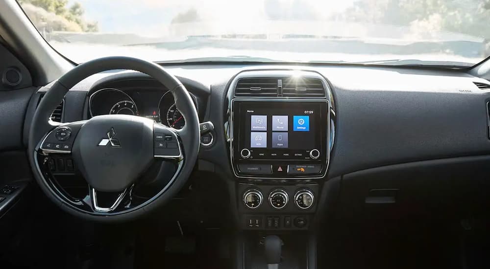 The interior of a 2020 Mitsubishi Outlander is shown from the center console.