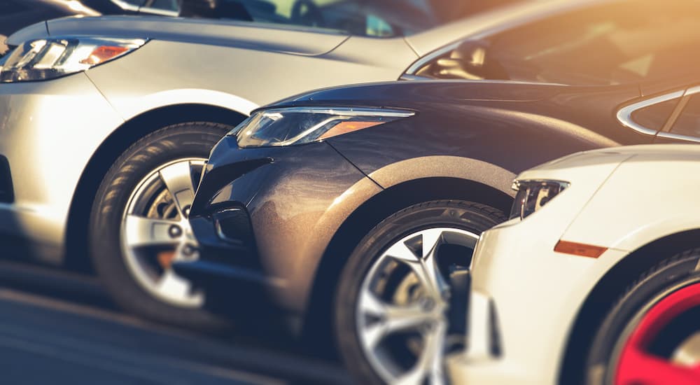 A row of cars are shown after searching "sell my car."