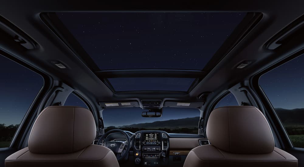 The interior of a 2022 Nissan Titan XD shows the sunroof.