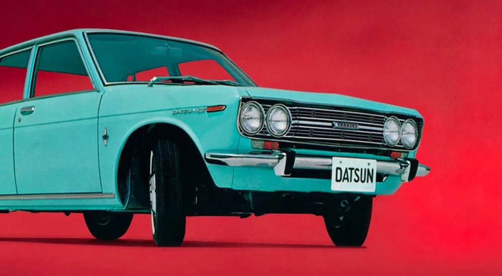 A teal 1970 Datsun 510 is shown from the front at an angle.