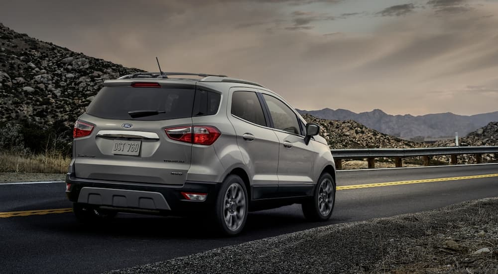 A silver 2022 Ford Ecosport is shown from the rear at an angle.