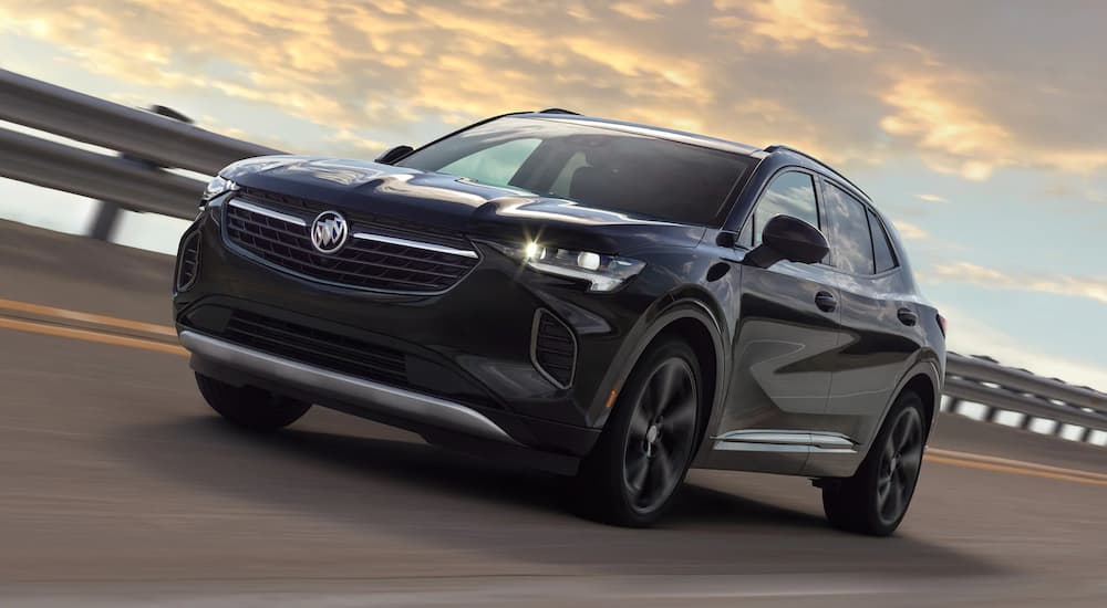 A black 2022 Buick Envision is shown after visiting a Buick dealer.