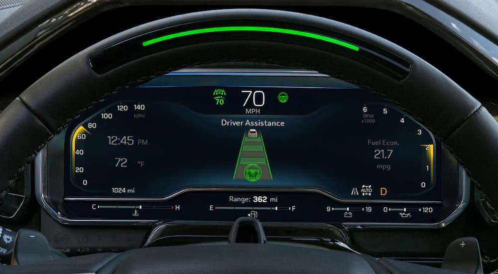 A close up of the dashboard of a 2022 Chevy Silverado 1500 High Country is shown at a Chevy truck dealer.