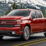 A red 2022 Chevy Silverado 1500 is shown from the front at an angle.