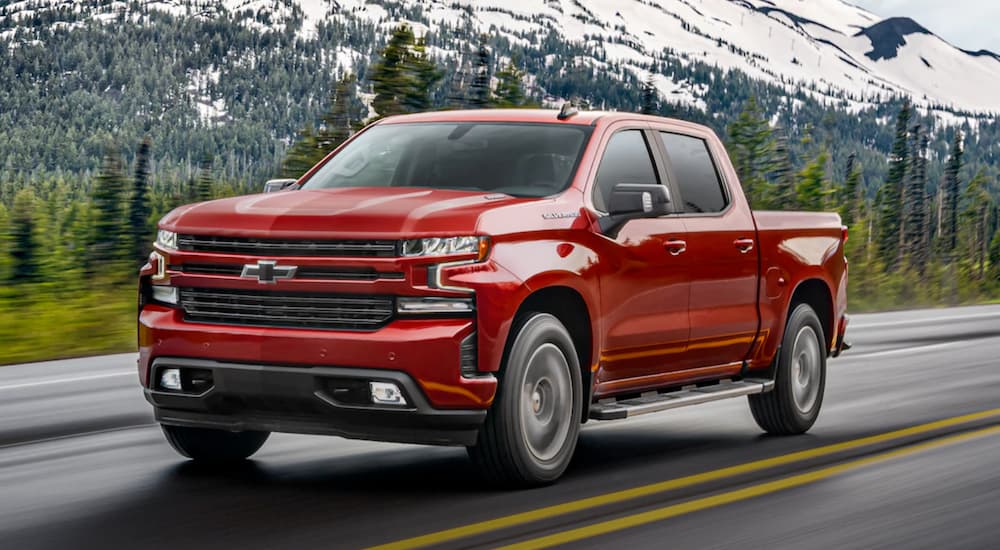 A red 2022 Chevy Silverado 1500 is shown from the front at an angle.