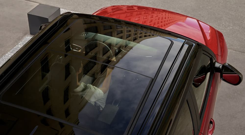 A red 2023 Chevy Trailblazer is shown from above.