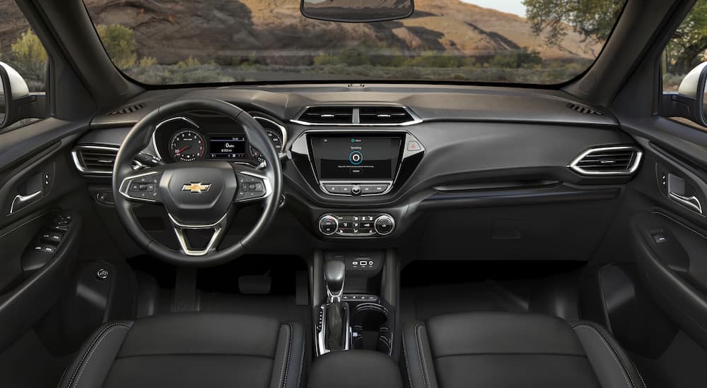 The interior of a yellow 2023 Chevy Trailblazer Activ is shown from above the center console.