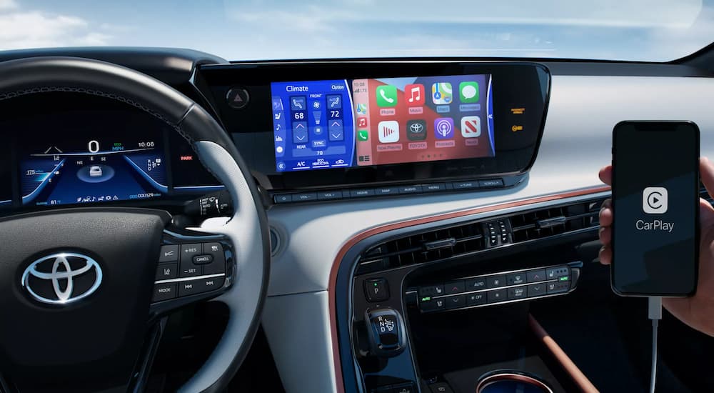Apple CarPlay is shown being used in a 2022 Toyota Mirai.