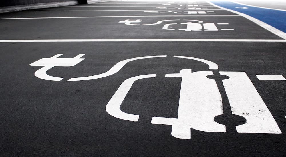 A close up of EV charging parking spots are shown.