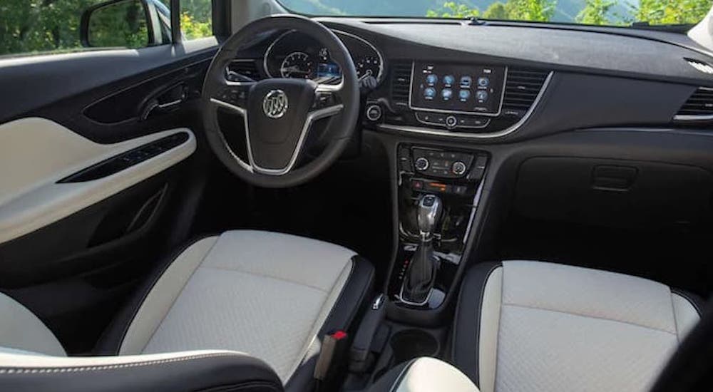The white interior of a 2023 Buick Encore GX is shown.