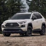 A white 2022 Toyota RAV4 TRD is shown parked from the front.