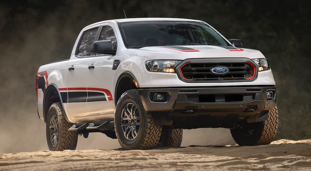 A white 2022 Ford Ranger Tremor is shown from the front when parked off-road during a 2022 GMC Canyon vs 2022 Ford Ranger comparison.