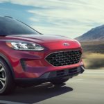 A red 2022 Ford Escape SE is shown leaving a Ford dealer near you.