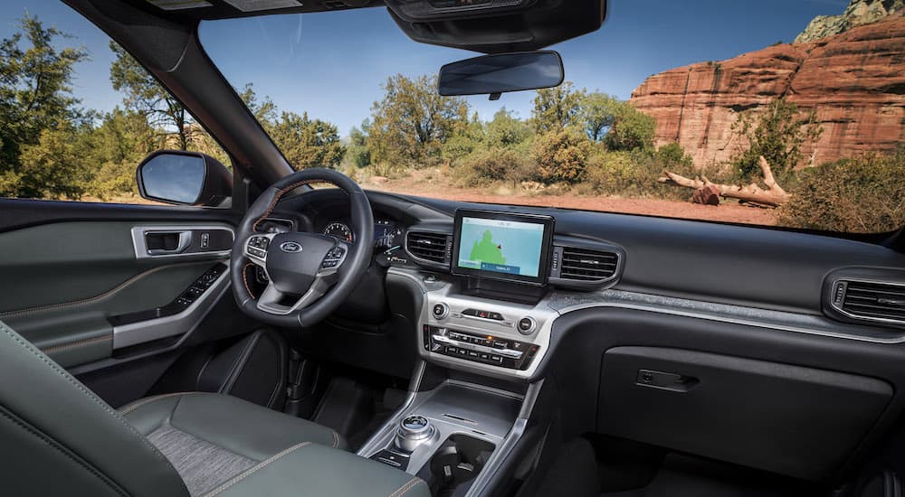 The interior of a 2022 Ford Explorer Timberline is shown from the passenger seat.
