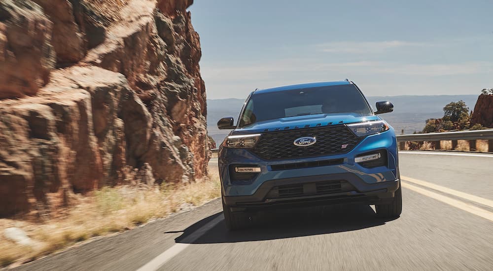 A blue 2022 Ford Explorer ST is shown from the front.