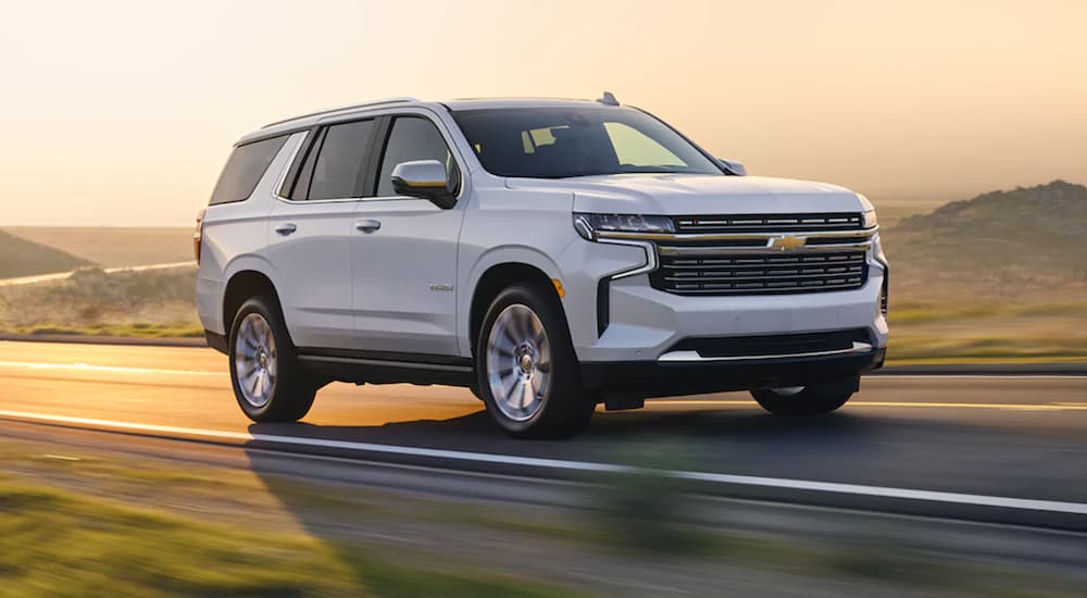 A white 2021 Chevy Tahoe is shown from the front at angle.