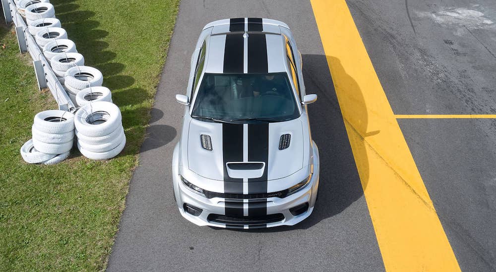 A silver 2022 Dodge Challenger SRT Hellcat Widebody is shown from the front at a high angle.