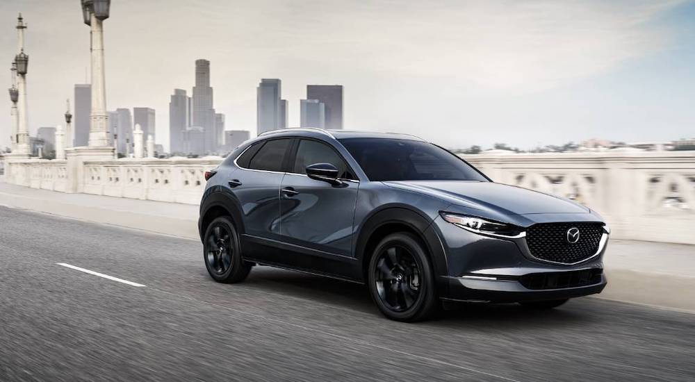 A grey 2022 Mazda CX-30 is shown from the front at an angle.