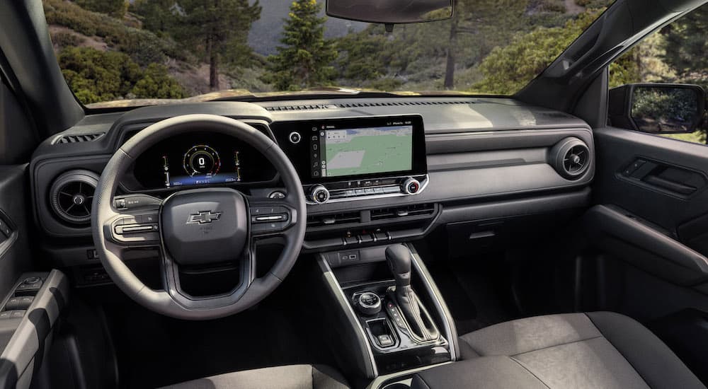 The interior of 2023 Chevy Colorado Trail Boss is shown from the drivers seat.