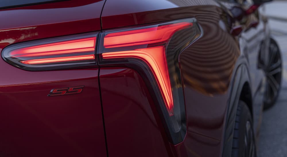 A close-up of the passenger side tail light on a red 2024 Chevy Blazer EV SS.