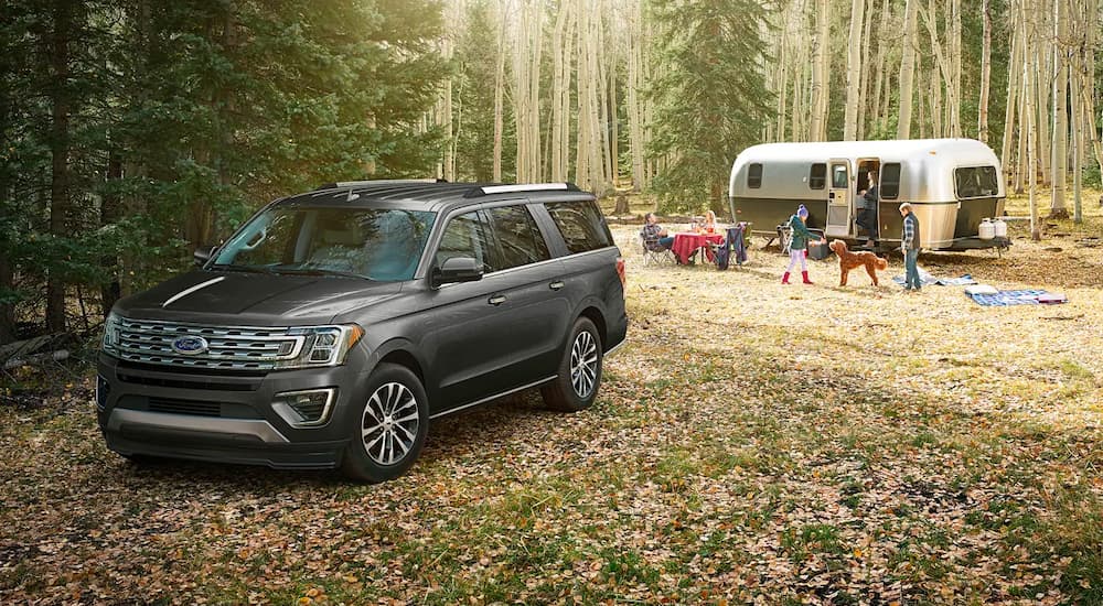 A grey 2023 Ford Expedition XLT MAX is shown at a camp site after leaving a Chevy dealer in Olive Branch, MS.