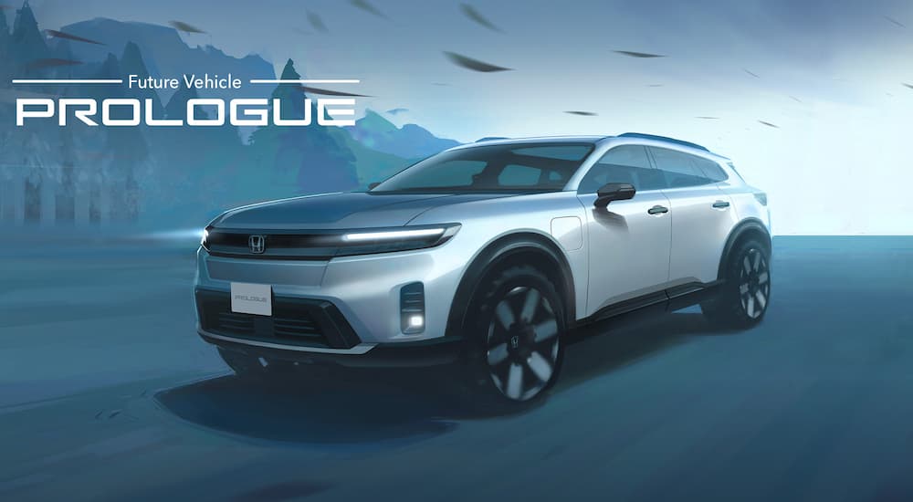 A grey 2024 Honda Prologue is shown during a teaser trailer.