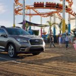 A brown 2022 Subaru Ascent is shown parked at a boardwalk.